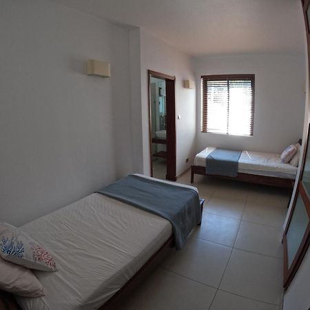 Olana Blue - Beachfront Apartment Rivière Noire Buitenkant foto